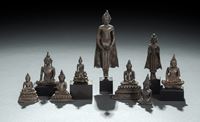 <b>TEN SILVER,  SILVER FOIL OR METAL FIGURINES OF BUDDHA SHAKYAMUNI</b>