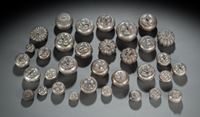 <b>A GROUP OF SILVER FRUIT-SHAPED LIDDED BOXES ET AL.</b>