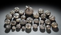 <b>A GROUP OF FRUIT-SHAPED SILVER AND OTHER METAL BOXES</b>