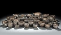 <b>A GROUP OF SILVER AND METAL RELIEF BOWLS</b>