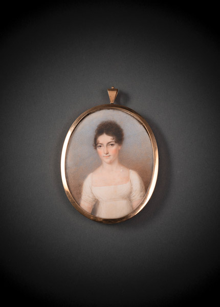 <b>A PORTRAIT MINIATURE OF A YOUNG LADY IN A WHITE DRESS</b>