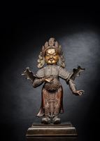 <b>AN EMBOSSED AND CAST COPPER FIGURE OF A DVARAPALA</b>
