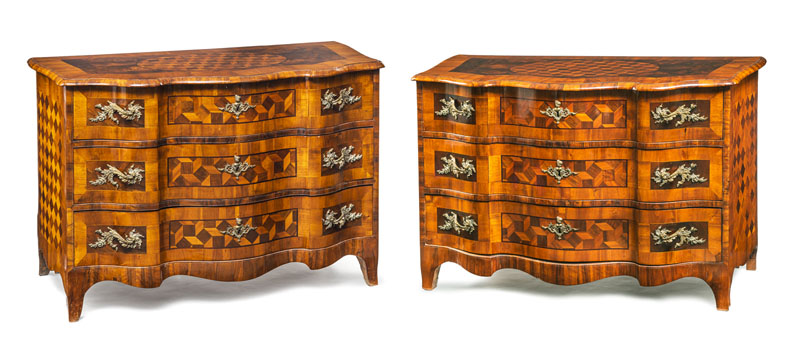 The three-side curved body with three drawers and rich rhombus marquetry. Restorations and minor additions.