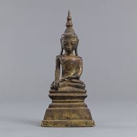 <b>A BRONZE FIGURE OF BUDDHA ON AN INSCRIBED THRONE</b>