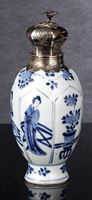 <b>A BLUE AND WHITE VASE WITH EUROPEAN SILVER MOUNTS AND COVER</b>