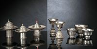 <b>A GROUP OF THREE SILVER STANDS AND CUPS AND COVERS AND TWO BUTTER LAMPS</b>
