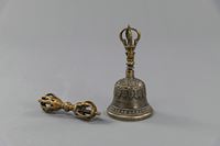 <b>A NINE-SPOKE BRONZE VAJRA AND GHANTA</b>