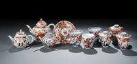 <b>A GROUP OF IMARI PORCELAIN: THREE TEAPOTS, THREE CUPS AND COVERS, THREE CUPS AND A SAUCER</b>