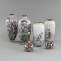 <b>THREE PAIRS OF CLOISONNÉ VASES DECORATED WITH POPPIES, HERONS IN THE REEDS AND PAIRS OF PHOENIXES IN RESERVES</b>