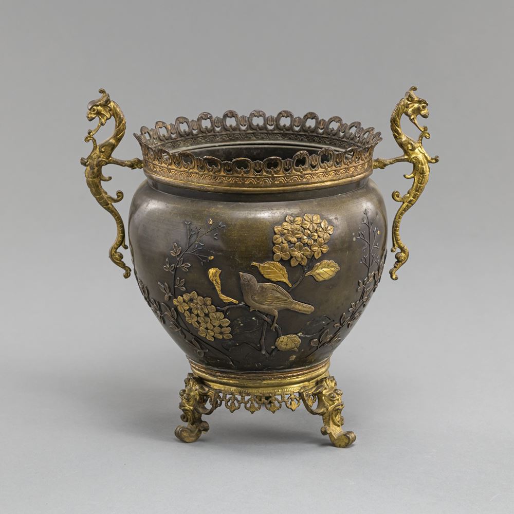<b>A BRONZE CACHEPOT WITH GOLD AND SILVER INLAY, DECORATED WITH SNOWBALL AND BIRD, BRONZE MOUNT</b>