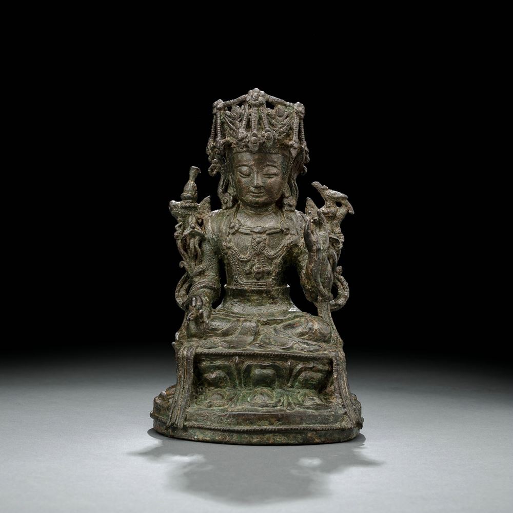 <b>A BRONZE FIGURE OF SAMANTHABADRA ON A LOTUS WITH GREEN PATINA</b>