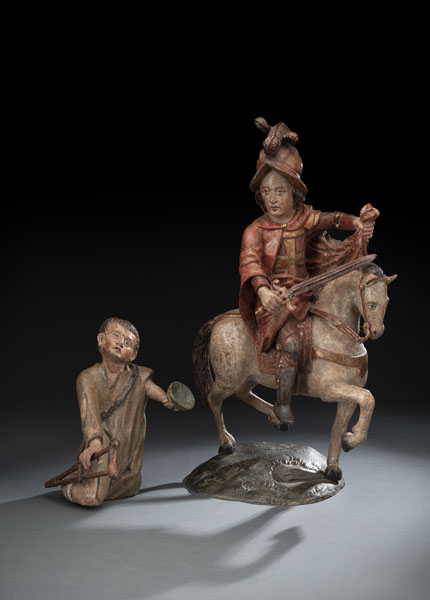 Both figures carved in full round. The beggar hardwood, St. Martin carved from limewood with later base. Remnants of old polychromy, ovrpainted. Restorations and additions.