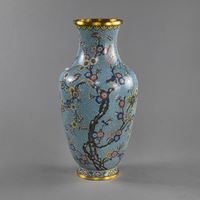 <b>A CLOISONNÉ VASE DECORATED WITH A BLOSSOMING PLUM TREE AND MAGPIES ON A LIGHT BLUE GEOMETRIC BACKGROUND</b>