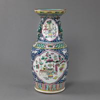 <b>A POLYCHROME PAINTED BALUSTER VASE WITH ANTIQUE DECORATION AND LION HANDLES</b>