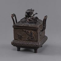 <b>A RECTANGULAR CAST BRONZE VESSEL AND COVER WITH RELIEF DECORATION OF SENNIN, COVER CROWNED WITH A RAT AND NUTS</b>