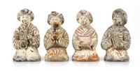 <b>A SET OF FOUR PAINTED POTTERY FIGURES OF LADIES PLAYING DIFFERENT MUSICAL INSTRUMENTS,</b>