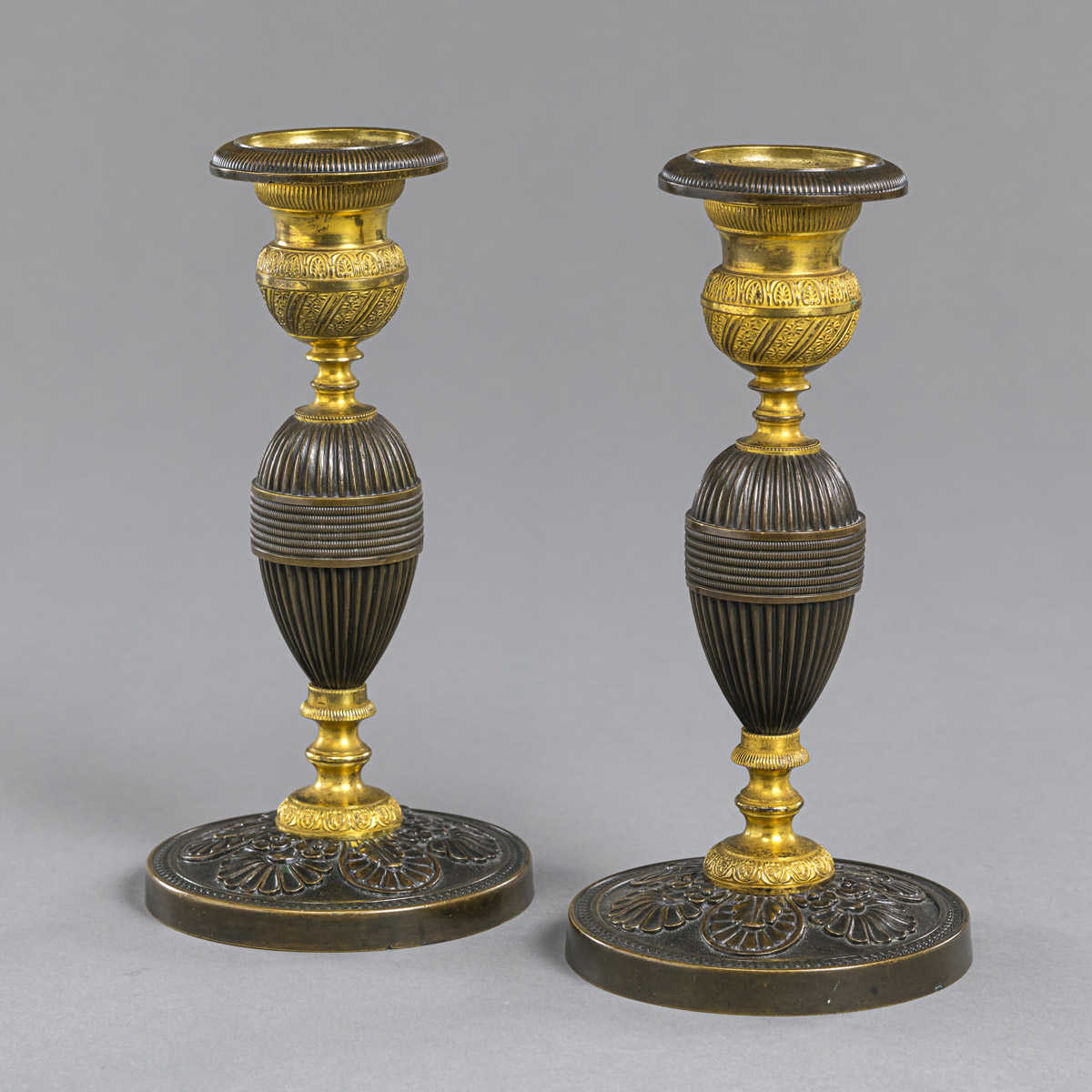 <b>A PAIR OF FRENCH CHARLES X CANDLESTICKS</b>