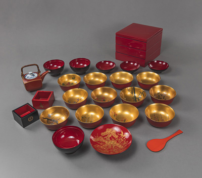 <b>A LARGE GROUP OF LACQUER, INCLUDING A STACKING BOX,  BOWLS AND COVERS, AND A PORCELAIN TEA POT FROM KIYOMIZU WARE. SOME WITH SIGNED KIRI BOXES</b>