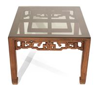 <b>A LOW HARDWOOD AND GLASS PLATE SIDE TABLE</b>