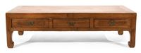 <b>A HARDWOOD THREE-DRAWER LOW TABLE</b>