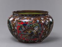 <b>A QUATREFOIL CLOISONNÉ DRAGON AND PHOENIX JARDINIERE</b>
