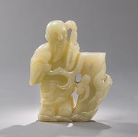 <b>A JADE VASE WITH IMMORTAL AND PEACH BRANCHES</b>