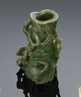 <b>A SPINACH-GREEN FINELY CARVED TREE TRUNK PINE VASE WITH CRANE, BAMBOO AND LINGZHI</b>