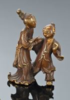 <b>A R-BRONZE WEIGHT IN SHAPE OF A BOY AND LADY WITH REMNANTS OF GILDING</b>