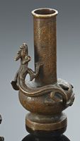 <b>A SMALL LOTUS DECORATED BRONZE VASE AS A STICK HOLDER WITH A CHILONG</b>