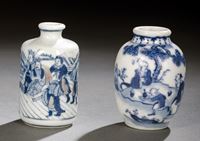 <b>TWO BLUE AND WHITE FIGURAL DECORATED PORCELAIN SNUFFBOTTLES, ONE WITH COPPER-RED</b>