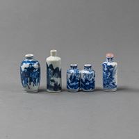<b>FOUR CYLINDRICAL UNDERGLAZE BLUE SNUFF BOTTLES WITH MOUNTAIN LANDSCAPE OR FIGURAL DECORATION</b>