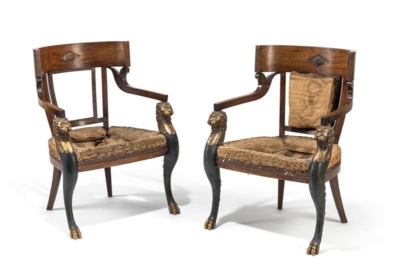 <b>Each with curved tablet back with carved rosette inset, flanked by floral shaped armrests, supported by carved legs with lion heads and paw feet,  flanking the trapezoid seat. Original remnats of seat textiles, minor losses of gilding and some damages due to age.</b>
