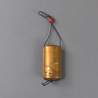 <b>A FIVE-CASE INTRO WITH GOLD LACQUER DECORATION OF CRANES IN A MOUNTAIN LANDSCAPE AND A RED OJIME</b>