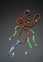 <b>A RARE CARVED FRUIT NUT AND GLASS COURT NECKLACE</b>