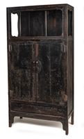 <b>A TWO-DOOR WOOD CABINET WITH DISPLAY SHELF</b>