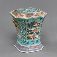 <b>AN OCTAGONAL FAMILLE ROSE RELIEF BOUGH POT WITH FIVE HOLE COVER</b>