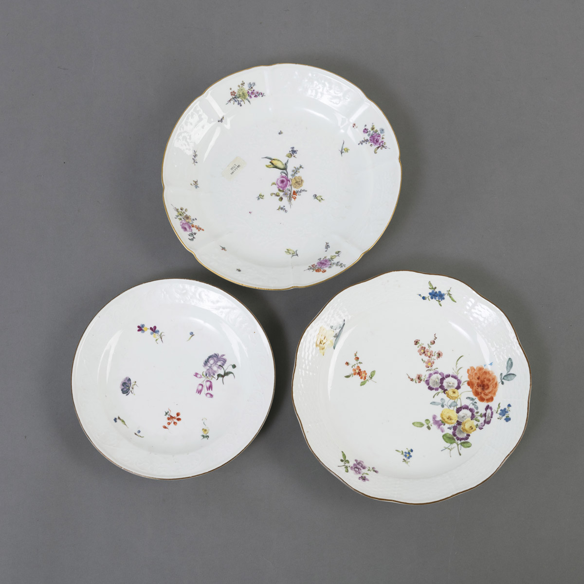 <b>A MEISSEN FLORAL PAINTED PLATE AND TWO ROUND DISHES</b>