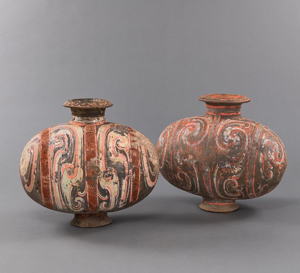 <b>TWO COCOON-SHAPED GREY POTTERY VESSELS WITH COLD PAINTED DECORATION</b>