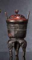 <b>A BRONZE VESSEL IN ARCHAIC STYLE WITH CARVED WOOD COVER</b>
