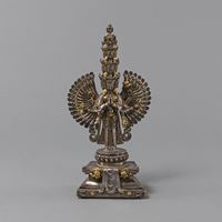 <b>A PART-GILT SILVER FIGURE OF THOUSAND-ARMED AVALOKITESHVARA</b>