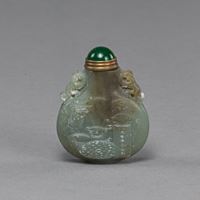 <b>A JADE INSCRIBED ANTIQUITIES SNUFFBOTTLE</b>