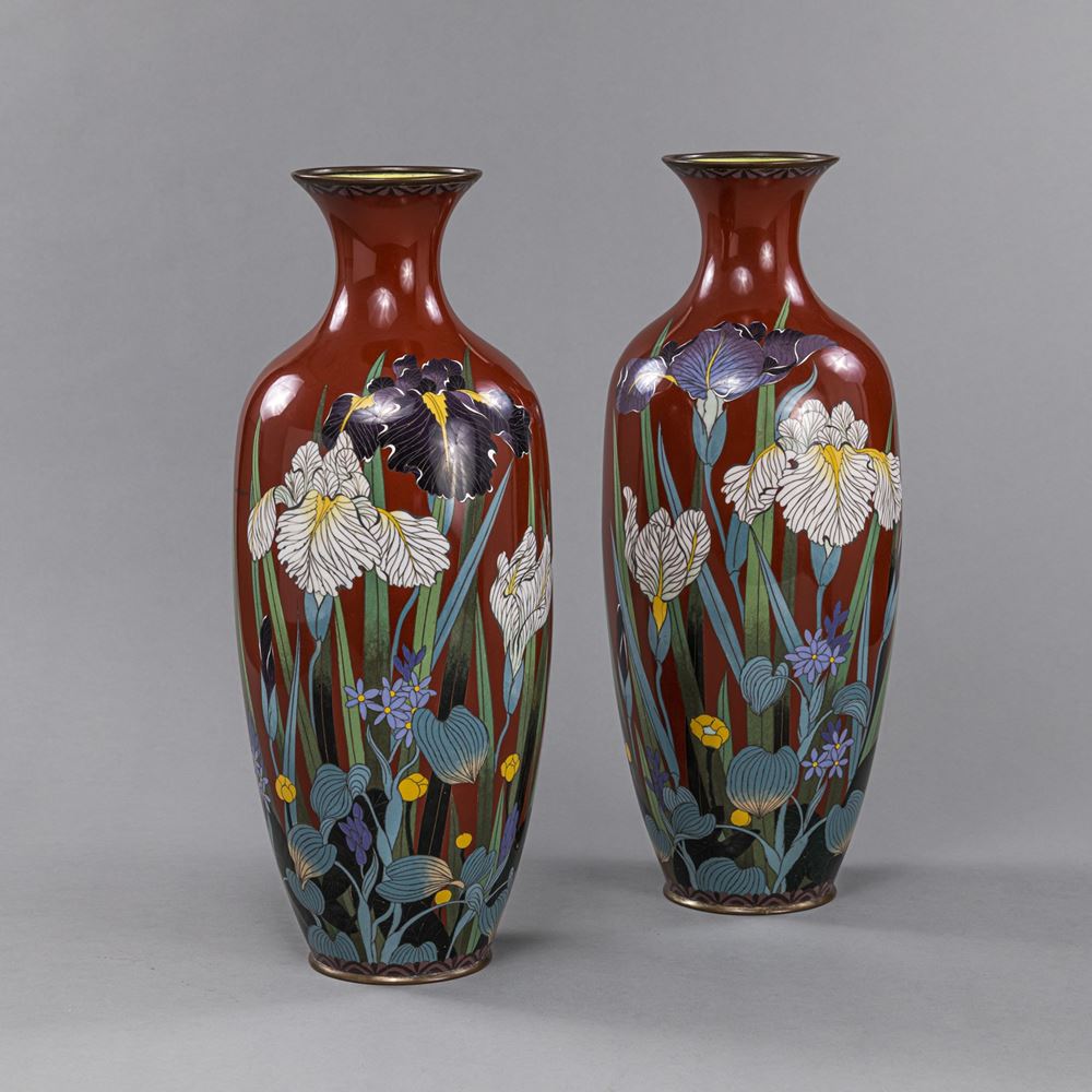 <b>A PAIR OF RED-GROUND IRIS CLOISONNÉ VASES</b>