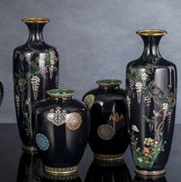 <b>TWO PAIRS OF CLOISONNÉ ENAMEL VASES: WISTERIA AND BIRDS ABOVE FLOWERS AND FLOWER MEDAILLONS AND KIRI BLOSSOMS</b>