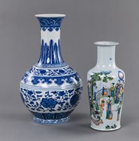 <b>A BLUE AND WHITE BOTTLE VASE AND A DOUCAI FIGURAL VASE</b>