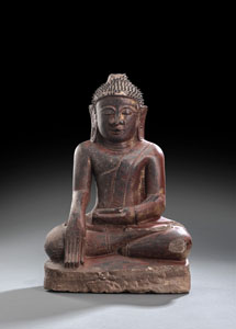 <b>A RED LACQUERED SANDSTONE FIGURE OF BUDDHA SHAKYAMUNI</b>