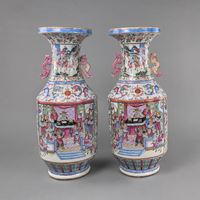 <b>A PAIR OF  'FAMILLE ROSE'  HANDLE VASES WITH DECORATION OF THEATER SCENES</b>