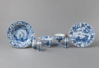 <b>TWO BLUE AND WHITE PORCELAIN DISHES, A BOWL, A STEMCUP, AND THREE MINIATURE VASES</b>
