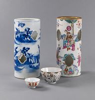 <b>TWO BLUE AND WHITE AND POLYCHROME PORCELAIN HAT STANDS AND TWO SMALL BOWLS</b>