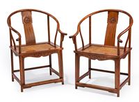 <b>A PAIR OF HORSESHOE-BACK ARMCHAIRS WITH MATTED SEATS AND CARVED DRAGON BACKRESTS</b>