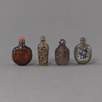 <b>FOUR SNUFF BOTTLES: TWO IN CLOISONNÉ, ONE IN AMBER COLORED GLASS WITH SILVER MOUNT AND ONE IN CRYSTAL</b>